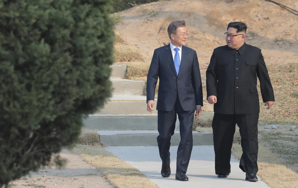 North Korean leader Kim Jong Un and South Korean President Moon Jae-in stroll together at the border village of Panmunjom in the Demilitarized Zone, South Korea. (File/AP)