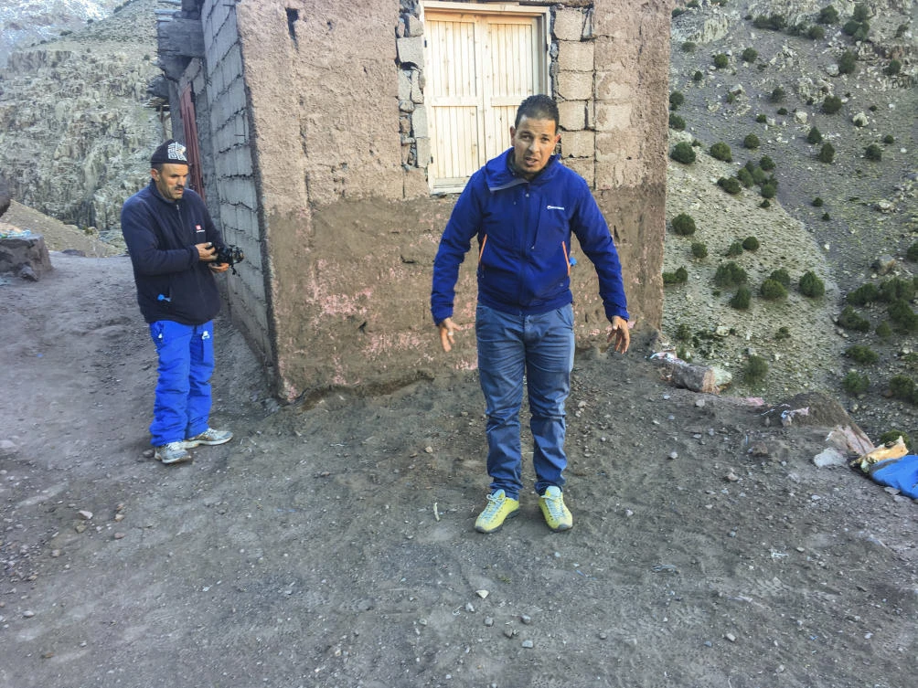Tour guide Rachid shows the sight Thursday Dec. 20, 2018, where he says one of the women where found in the murder of two Scandinavian hikers whose bodies were found at a camp in Morocco's High Atlas mountains, about 10 Km (six miles) from the remote village of Imlil, Morocco. (AP)