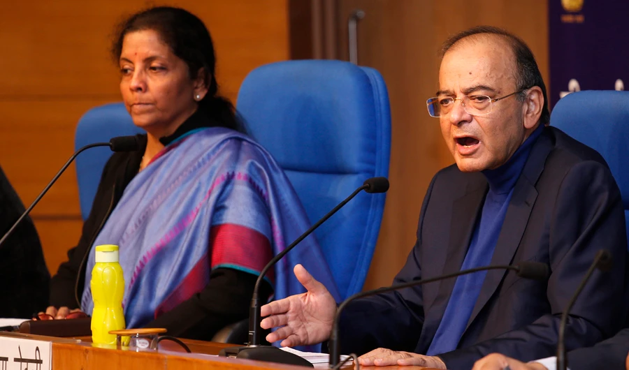Indian Finance Minister Arun Jaitley, right: “How else will terrorists who use technology extensively be traced? (AP)