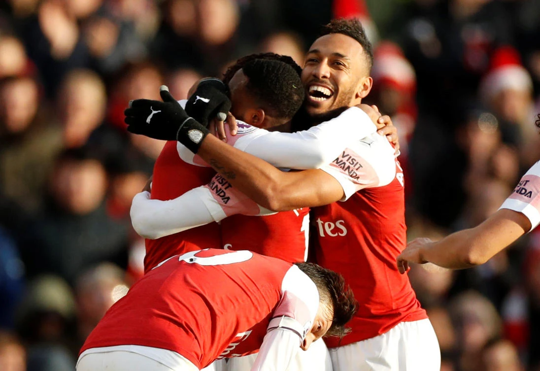 Arsenal's Alex Iwobi celebrates scoring their third goal with Pierre-Emerick Aubameyang, who scored two, against Burnley at the Emirates Stadium. (Action Images via Reuters)