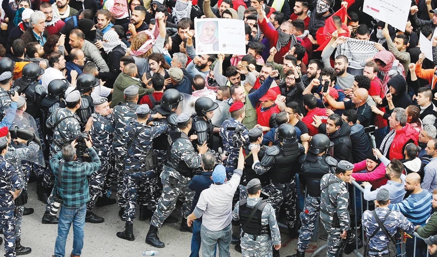 Hundreds of Lebanese take to street calling for an end to a stalemate over forming a government seven months after elections, on Dec. 16. (AP)