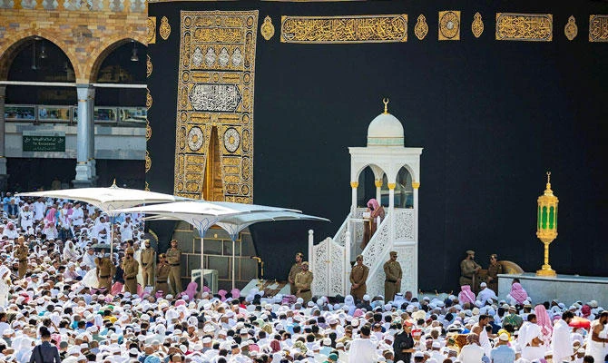 Saudi Arabian Imam of the Grand Mosque offers the khutba, or sermon, during Friday prayers in Makkah. (AFP)
