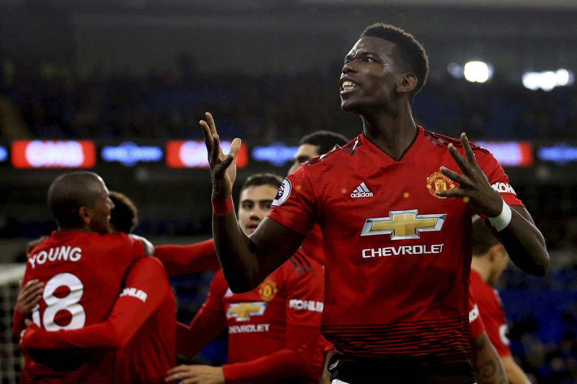 Manchester United midfielder Paul Pogba celebrates the fifth goal against Cardiff City. (AP)