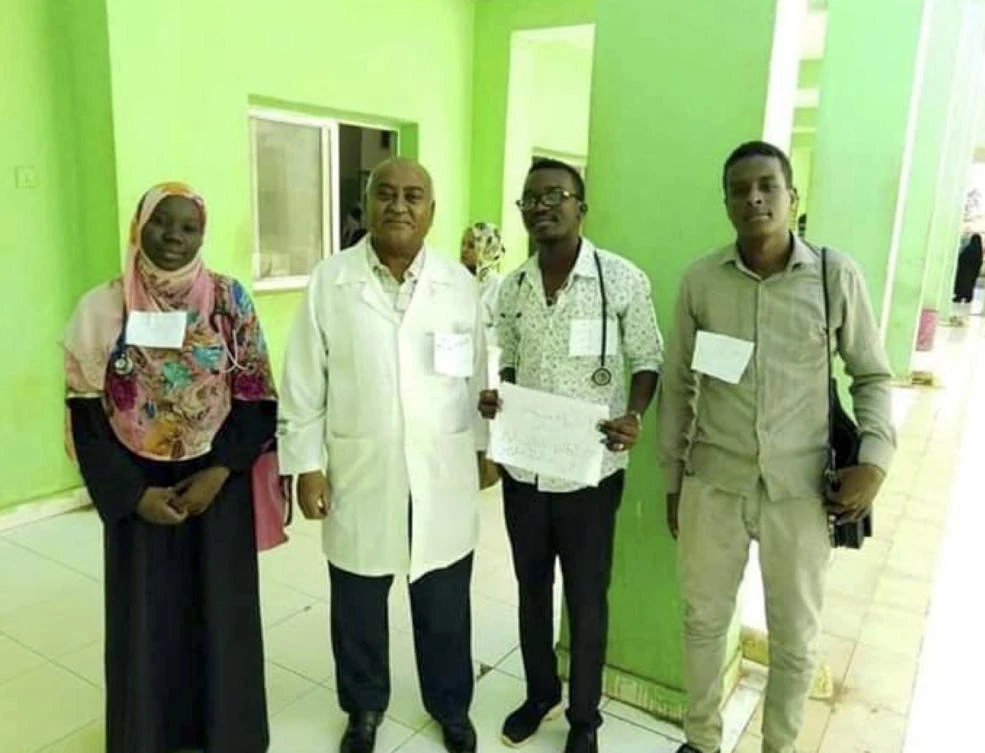 This handout image provided by a Sudanese Activist, shows doctors on strike at a hospital in Al Jazirah, Sudan, Monday, Dec. 24, 2018. (Sudanese Activist via AP)
