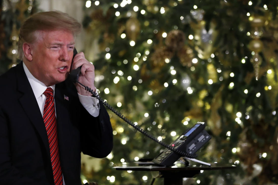 On Christmas Eve, Trump questions child about belief in Santa
