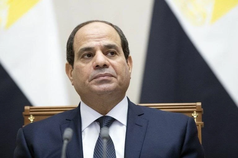 El-Sisi, who often tells Egyptians they must buckle down and accept hardships to get through hard times, said they must change their habits to shed the fat. (File/AFP)