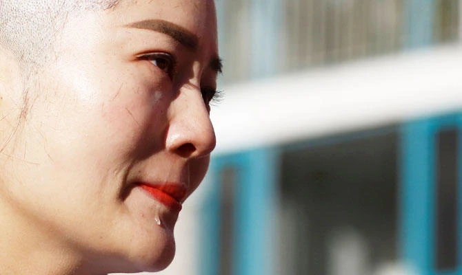 Heavy security as China opens trial of prominent rights lawyer