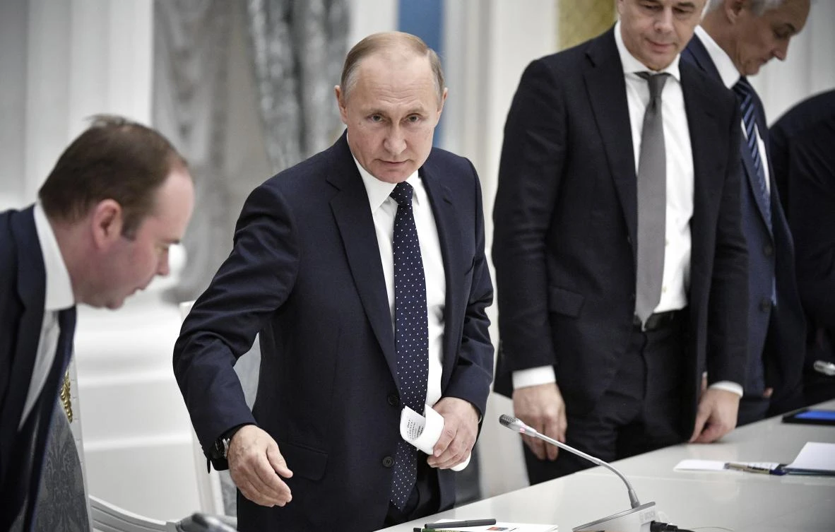 Russian President Vladimir Putin, center, arrives to attend a meeting with Russian businessmen in the Kremlin in Moscow, Russia, Wednesday, Dec. 26, 2018. (AP)