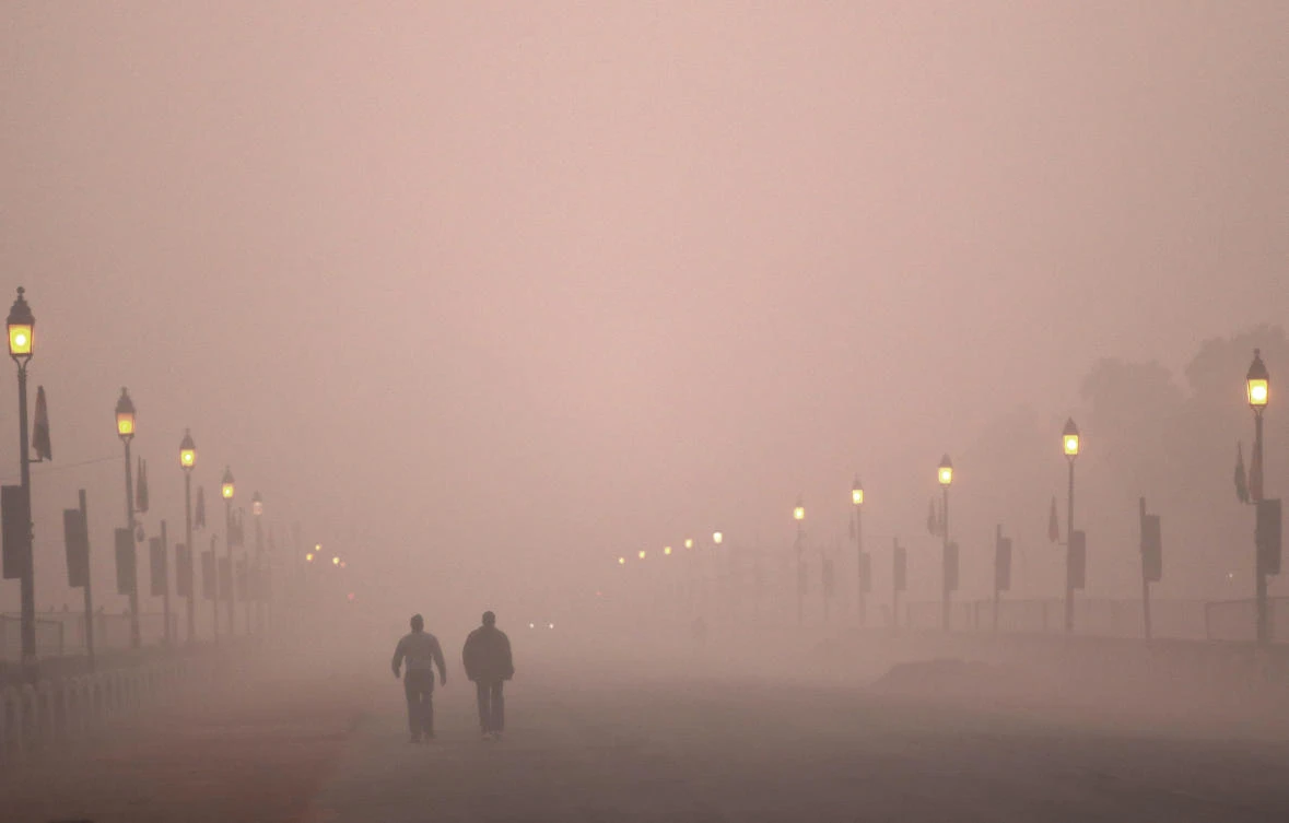 Authorities have ordered fire services to sprinkle water from high rise building to settle dust particles and stop burning of garbage and building activity in the Indian capital as the air quality hovered between severe and very poor this week posing a serious health hazard for millions of people. (AP/Manish Swarup)