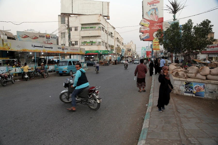People driving in a market in the Yemeni flashpoint city of Hodeidah. (File/AFP)