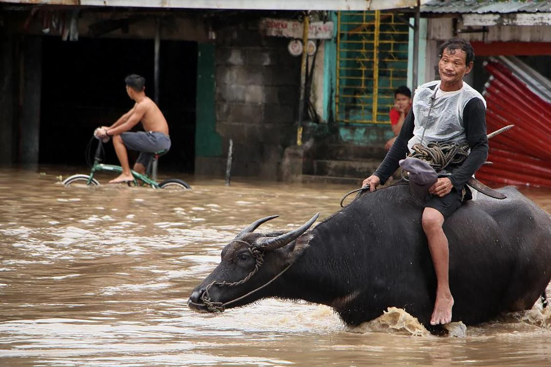 The weather disturbance locally named “Usman” hit the country on Saturday. (File/AFP)