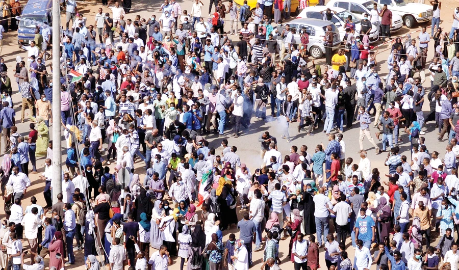 Protesters during a demonstration in Khartoum. Experts believe the protesters’ action shows the depth of popular discontent with the Sudanese leadership. (Reuters)