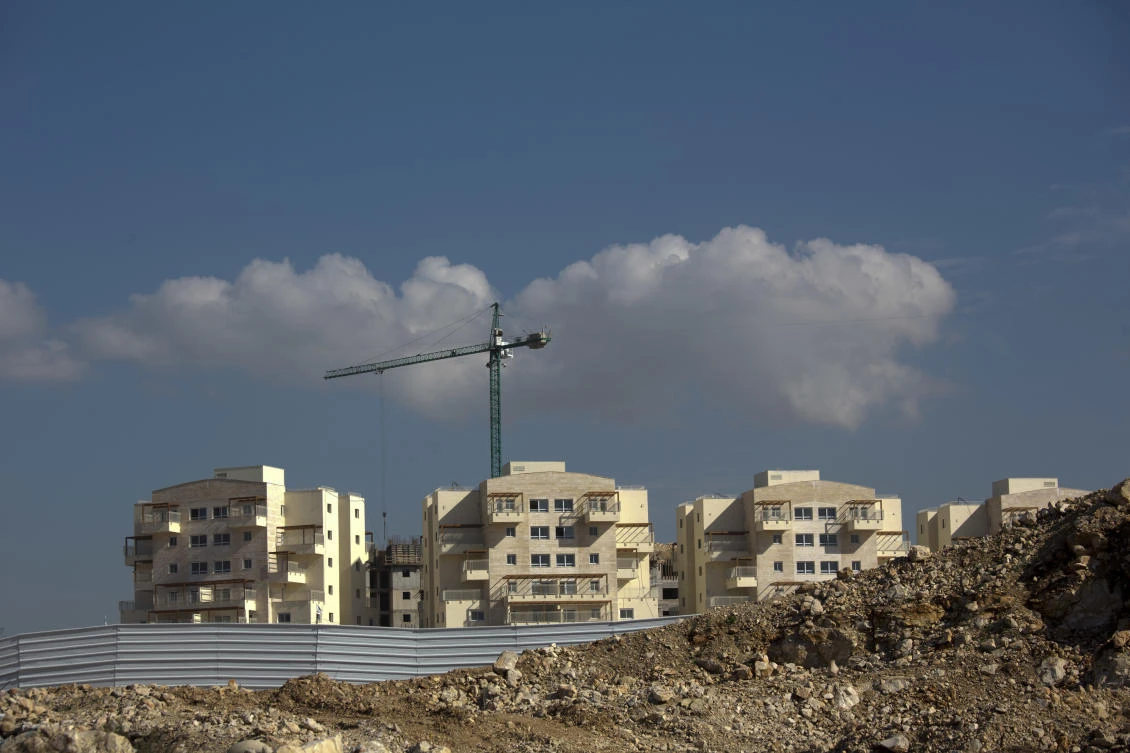 Data shows that the Israeli government — with little resistance from a friendly White House — has gone on a settlement push in the West Bank since President Donald Trump took office. That has laid the groundwork for what could be the largest binge in construction in years. (AP/Ariel Schalit)