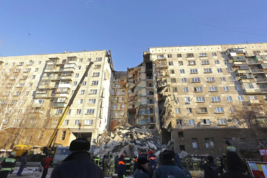 Emergency Situations employees working at the scene of a collapsed apartment building in Magnitogorsk, a city of 400,000 people, about 1,400 kilometers (870 miles) southeast of Moscow, Russia, Monday, Dec. 31, 2018. (AP)