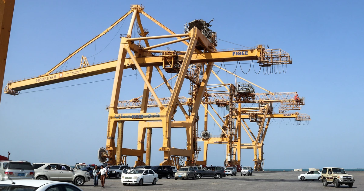A picture taken on December 24, 2018 shows a view of container cranes at the docks in the port of the Yemeni Red Sea city of Hodeidah. (AFP)