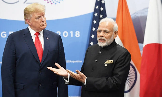 In this file photo taken on November 30, 2018, US President Donald Trump listens to India's Prime Minister Narendra Modi during a meeting in the sidelines of the G20 Leaders' Summit in Buenos Aires, Argentina. (AFP)