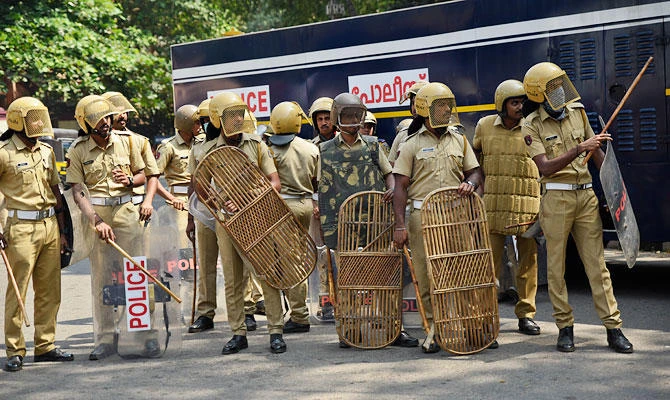 Policemen take position outside the state secretariat anticipating protests following reports of two women of menstruating age entering the Sabarimala temple, one of the world's largest Hindu pilgrimage sites, in Thiruvananthapuram, Kerala, India, Wednesday, Jan. 2, 2019. (AP)