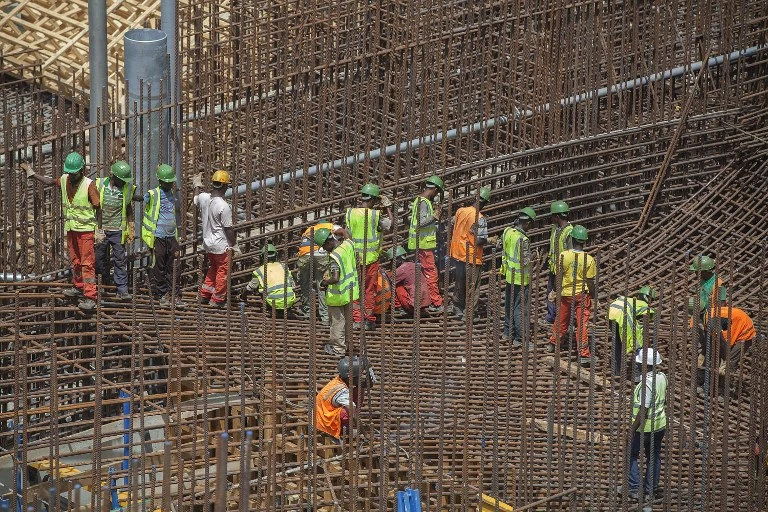 In this file photo, Ethiopian workers stand on scaffolding during the construction of the Grand Renaissance Dam near the Sudanese-Ethiopian border. (AFP)