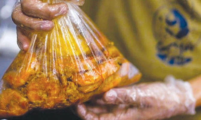 The most eye-catching element of the restaurant is that the seafood of choice is cooked and served in a bag. (Supplied)