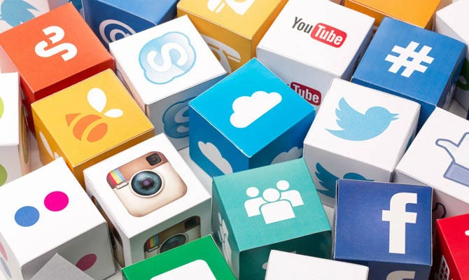 Paper cubes with Popular social media services icons. (Supplied)
