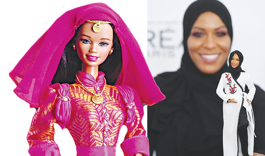 US Olympic medalist Ibtihaj Muhammad with her Barbie model and, the Moroccan Saghira. (AFP)