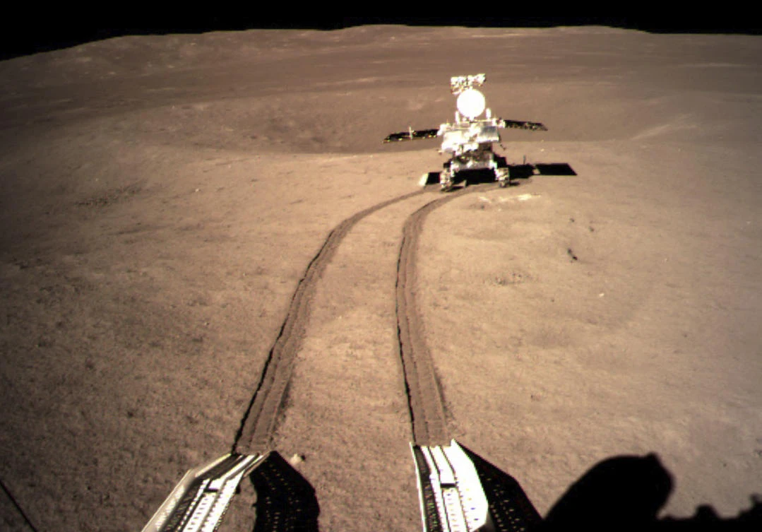 China’s lunar rover leaves wheel marks after leaving the lander that touched down on the surface of the far side of the moon. (China National Space Administration/Xinhua News Agency via AP)