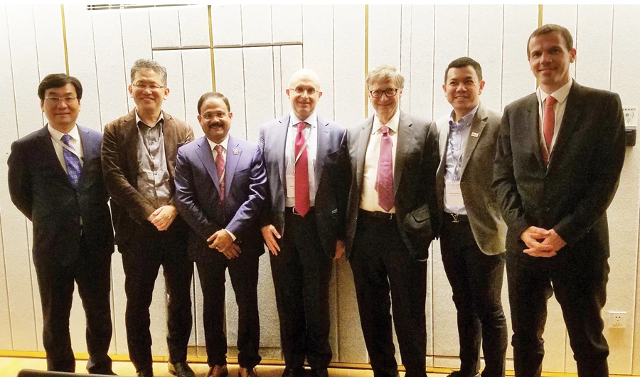 Dr. Siddeek Ahmed, chairman of Eram Scientific Solutions, and Bill Gates, co-founder of Microsoft, along with other participants at the Reinvented Toilet Expo in Beijing recently.
