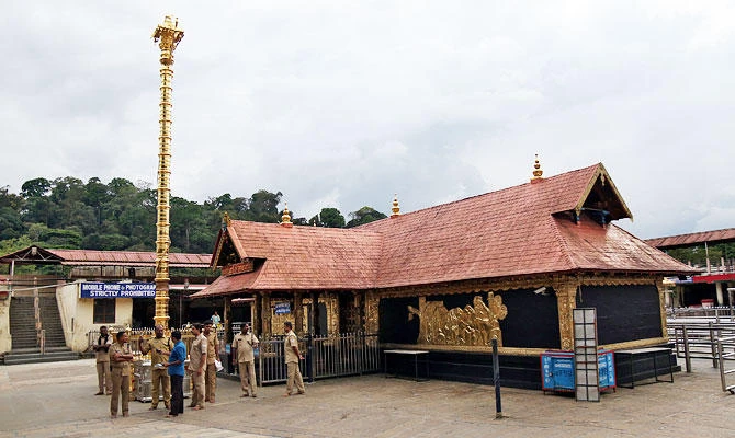 Police stand inside the premises of the Sabarimala temple in Pathanamthitta district in the southern state of Kerala, India, October 17, 2018. (REUTERS)