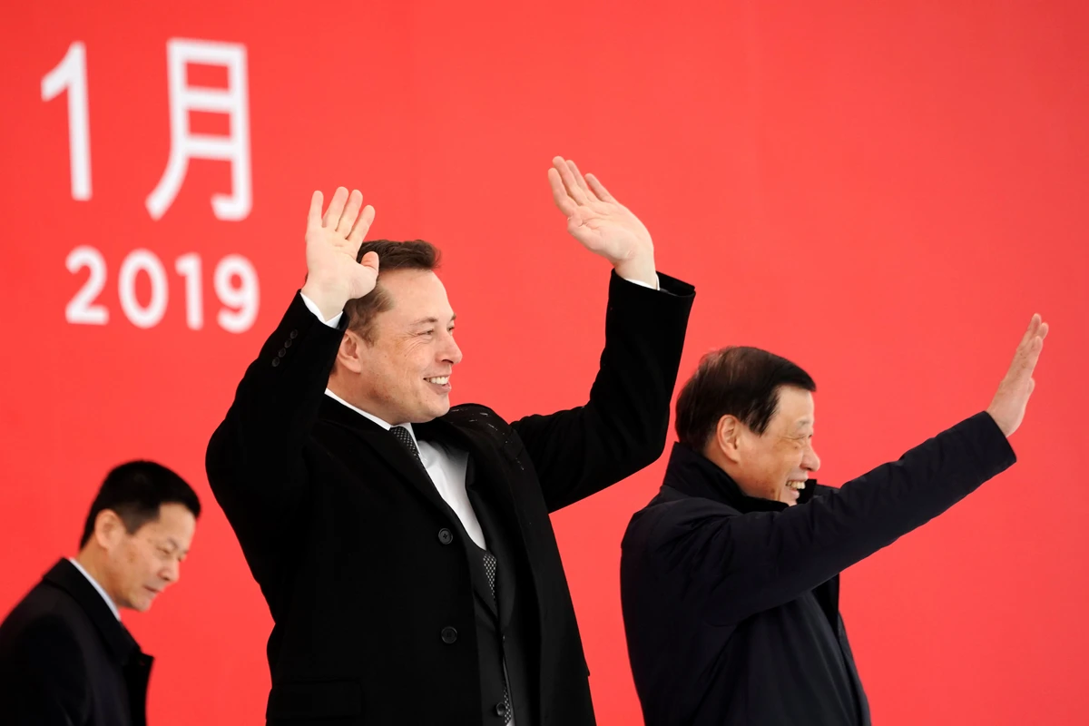 Tesla CEO Elon Musk, center, and Shanghai’s Mayor Ying Yong, right, attend the Tesla Shanghai Gigafactory groundbreaking ceremony in Shanghai. (Reuters)