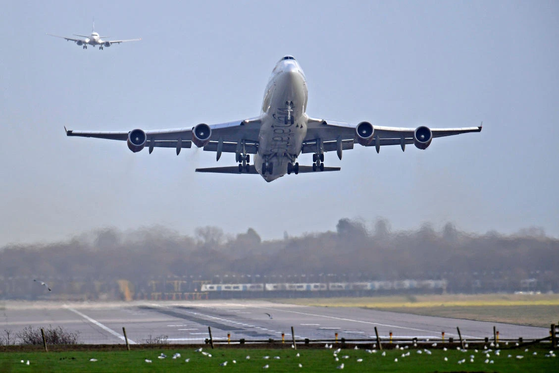 An airplane takes off at Gatwick Airport, after the airport reopened to flights following its forced closure because of drone activity. (Reuters file photo)