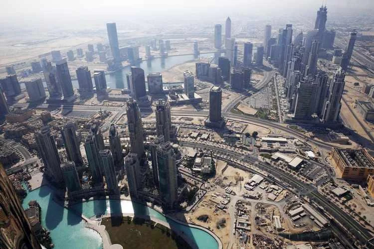 Mergers in the UAE banking sector are likely to accelerate because of a slowing economy and a slide in property prices with smaller banks bearing the brunt of the downturn. (Reuters)