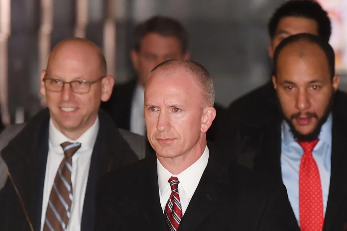 Deputy US Trade Representative Jeffrey Gerrish (C) leaves a hotel with his negotiation team for the second day of talks in Beijing on January 8, 2019. (File/AFP)