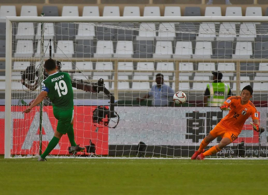 Turkmenistan’s midfielder Ahmet Atayev scores form the penalty spot during the UAE 2019 Asian Cup match against Japan at the Al-Nahyan Stadium in Abu Dhabi. Japan won the match 3-2. (AFP)