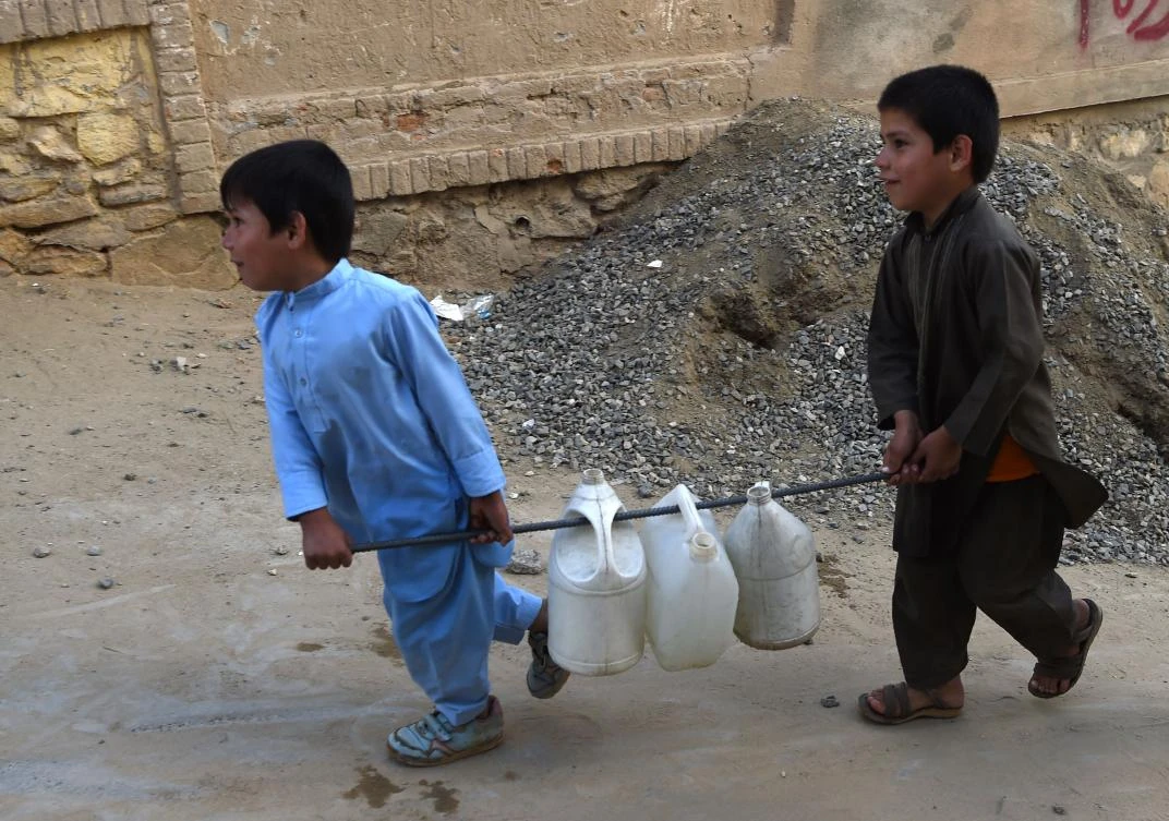 Only around 20 percent of Kabul is connected to the city’s piped water system, leaving many residents to ensure their own supply by digging wells that are often shared by several neighbors. (AFP)