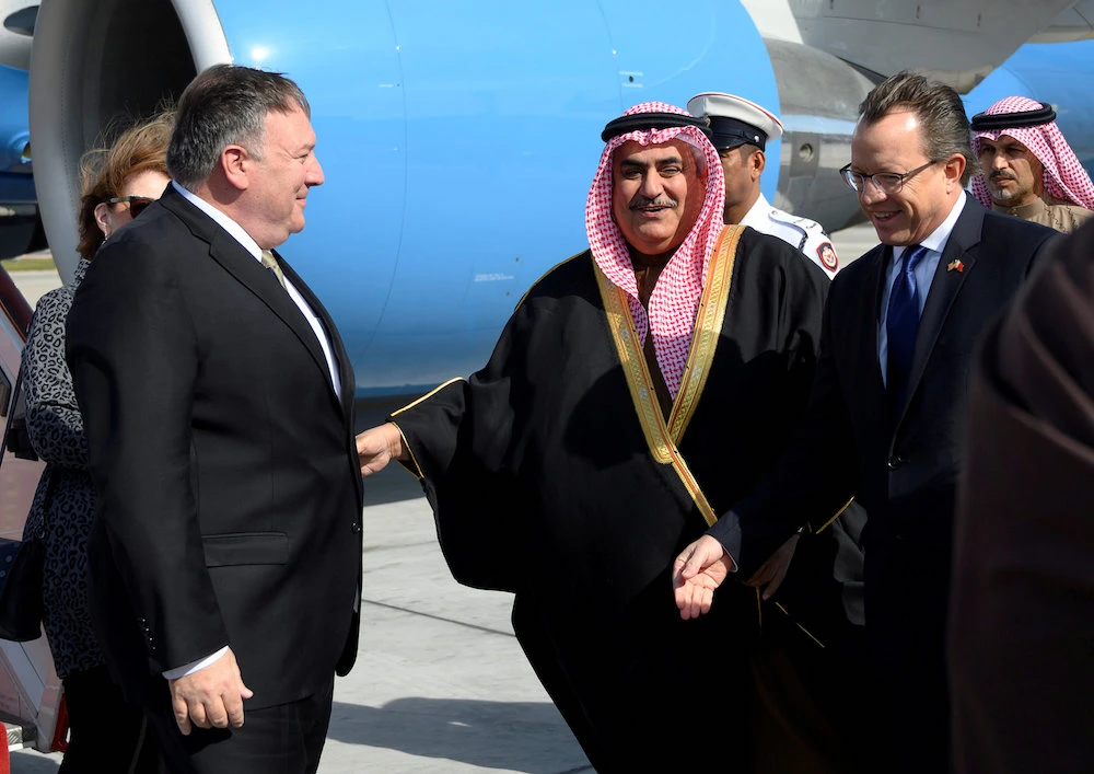 US Secretary of State Mike Pompeo is greeted by Bahraini Foreign Minister Khalid bin Ahmed Al Khalifa after arriving at Manama International Airport in Manama, Bahrain, Jan. 11, 2019. (Reuters)