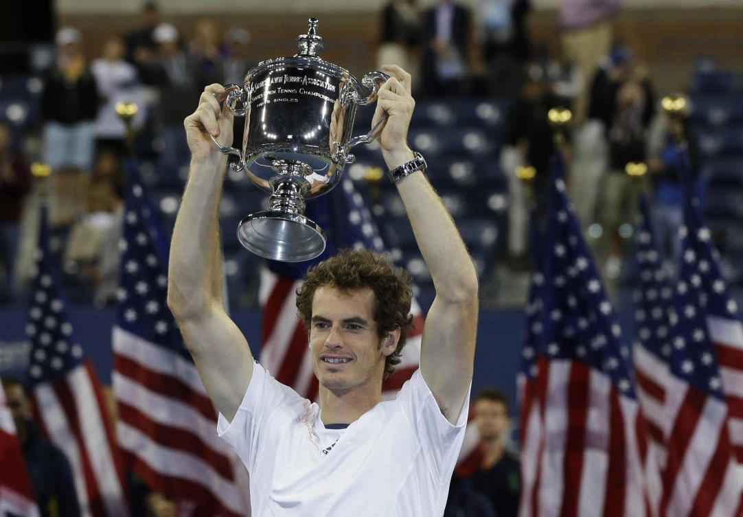 Andy Murray after defeating Novak Djokovic to win the 2012 US Open in New York. Murray said he would like to retire at Wimbledon but admitted it may come sooner than that. (AP Photo)