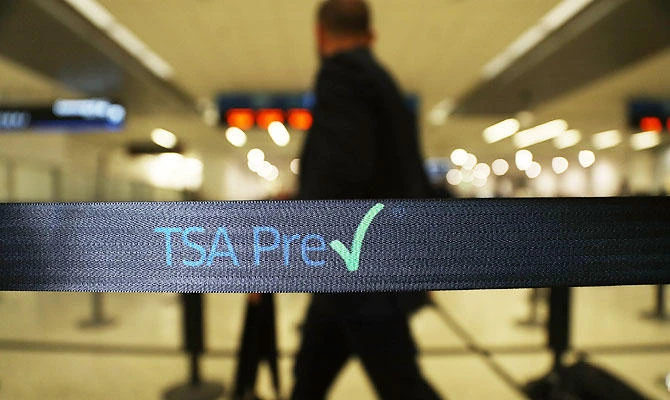 In this file photo taken on June 2, 2016, travelers go through the TSA PreCheck security point at Miami International Airport. (AFP)