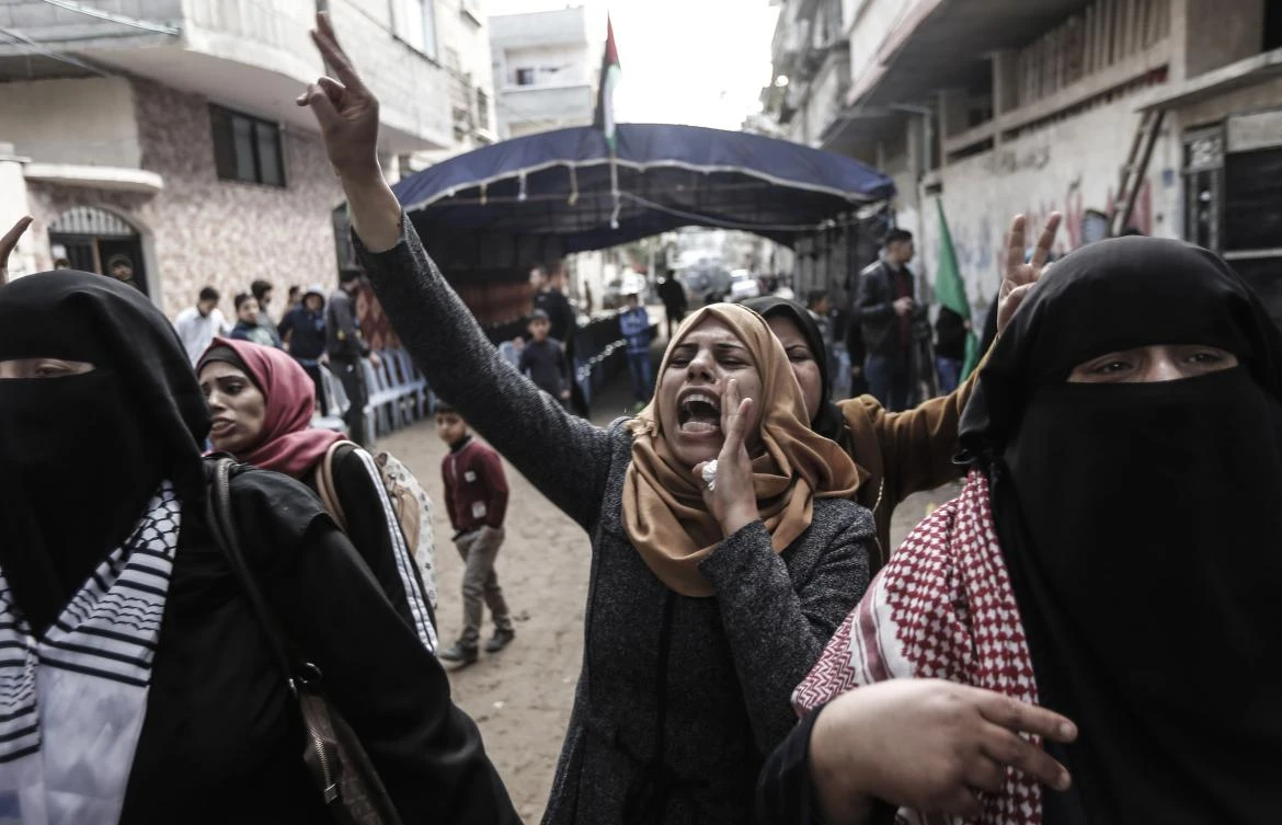Relatives of Amal Al-Taramsi, who was shot dead by Israeli forces during protests along the Gaza border yesterday, mourn during her funeral in Gaza City on Saturday, January 12, 2019. (AFP)