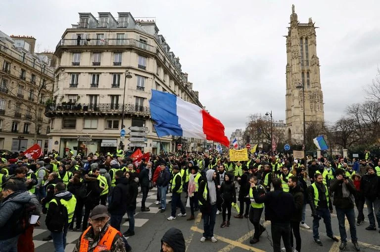 The movement, which began as protests over high fuel taxes, has snowballed into a wholesale rejection of French President Emmanuel Macron and his policies. (AFP)