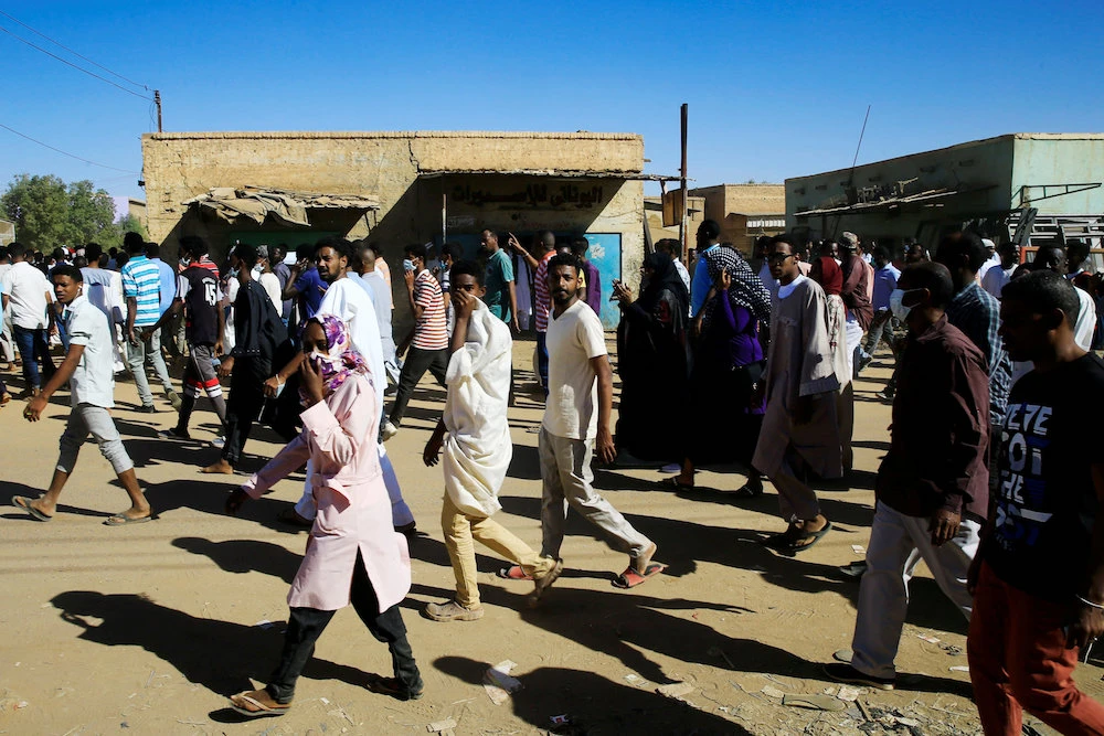 Sudanese demonstrators march along the street during anti-government protests after Friday prayers in Khartoum, Sudan January 11, 2019. (Reuters)