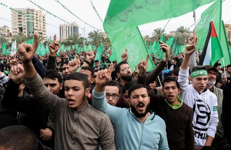 Palestinians attend a rally marking the 31st anniversary of Hamas' founding, in Gaza City December 16, 2018. (AFP)