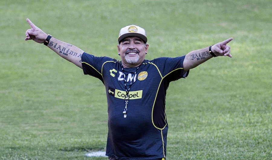 In this file photo taken on September 10, 2018 Argentine legend Diego Maradona gestures during his first training session as coach of Mexican football club Dorados, at the Banorte stadium in Culiacan, Sinaloa State, Mexico. (AFP / Pedro Pardo)