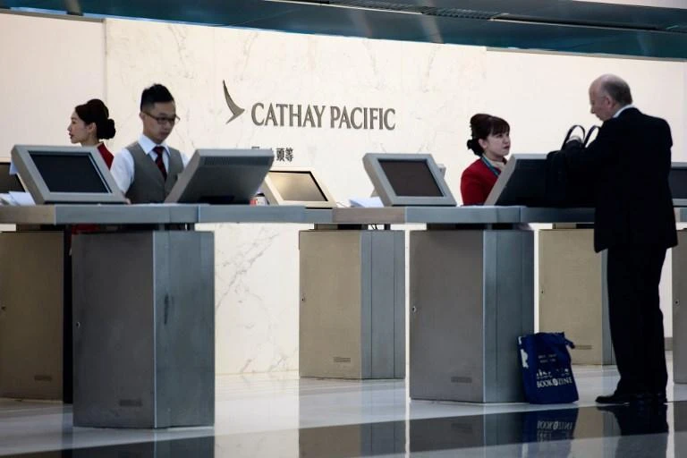 Cathay Pacific’s website sold steeply discounted premium flights on Sunday. (AFP)