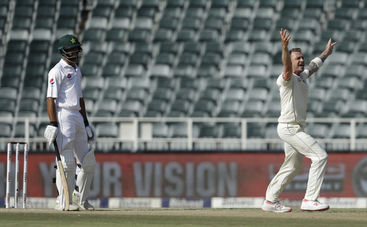 South Africa's batsman Dale Steyn, right, successfully appeals for LBW against Pakistan's Shan Masood on day three of the third cricket test match between South Africa and Pakistan at the Wanderers stadium in Johannesburg, South Africa, Sunday, Jan. 13, 2019. (AP Photo/Themba Hadebe)