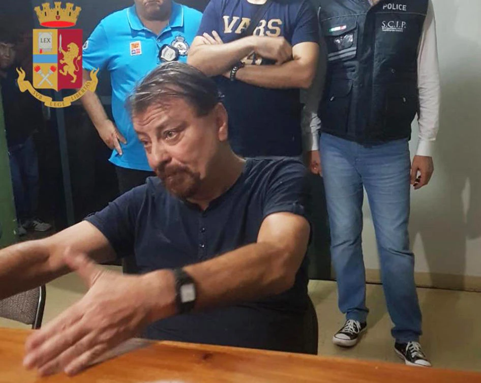Italian fugitive captured 3 decades after murder conviction