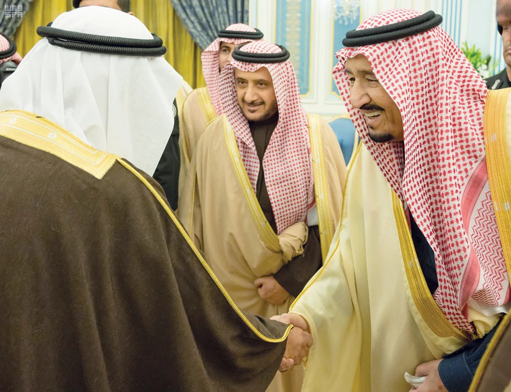 King Salman received religious scholars, Shoura Council members and a group of citizens at Al-Yamamah Palace in Riyadh on Sunday. (SPA)