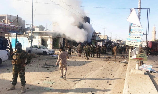 Smoke rises after a car bomb exploded in Iraqi border town of al-Qaim, Iraq January 11, 2019. (REUTERS)