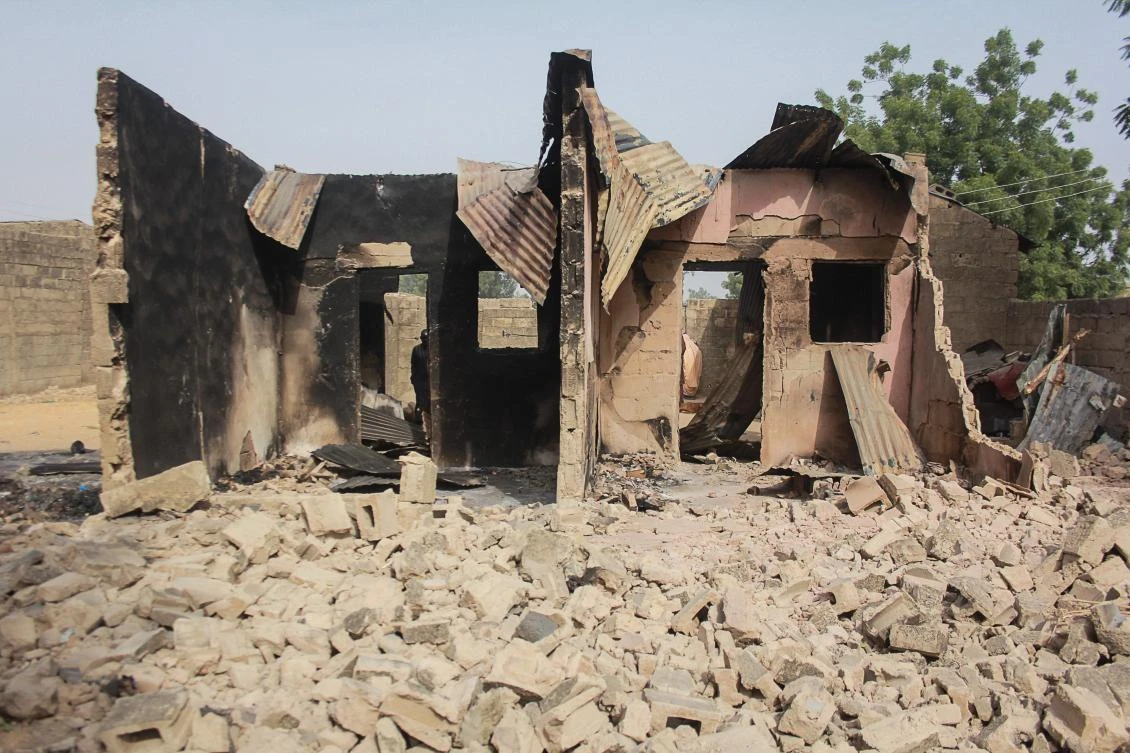 A man looks at the rubbles and remains of a house following an attach, at the Sajeri village, on the outskirts of the Borno state capital, Maiduguri, on January 8, 2019. (File/AFP)