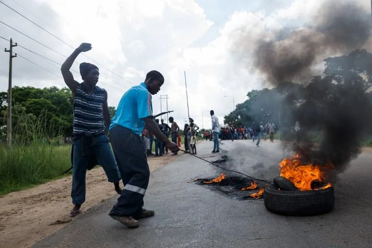Several people were killed and some 200 arrested during Monday’s protests in the Zimbabwean capital Harare. (AFP)