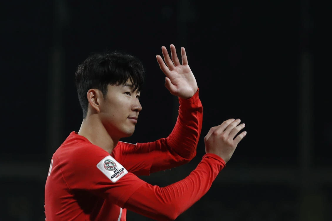 South Korea’s forward Son Heung-Min applauds fans at the end of the AFC Asian Cup group C match between South Korea and China at Al Nahyan Stadium in Abu Dhabi. (AP Photo)